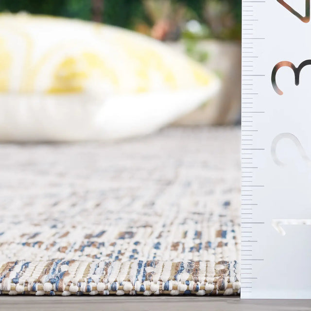 Safavieh Courtyard 5'-3" x 7'-7" Rug in Ivory Blue / Beige