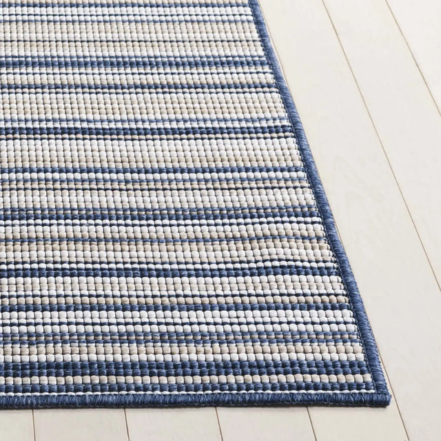Safavieh Escape 600 5'-3" x 7'-6" Rug in Beige / Blue