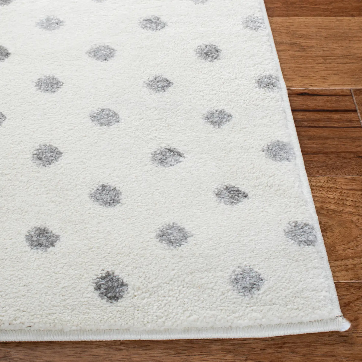 Safavieh Carousel Kids 100 4'-0" x 6'-0" Rug in Ivory Grey / Pink