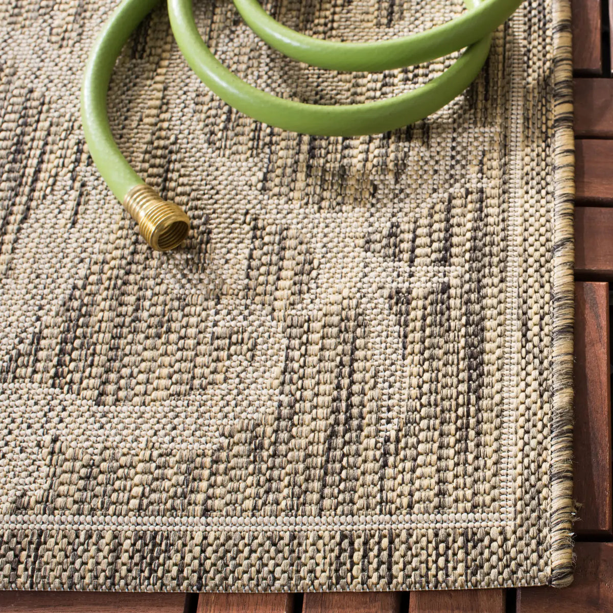 Safavieh Courtyard 5'-3" x 7'-7" Rug in Brown / Natural