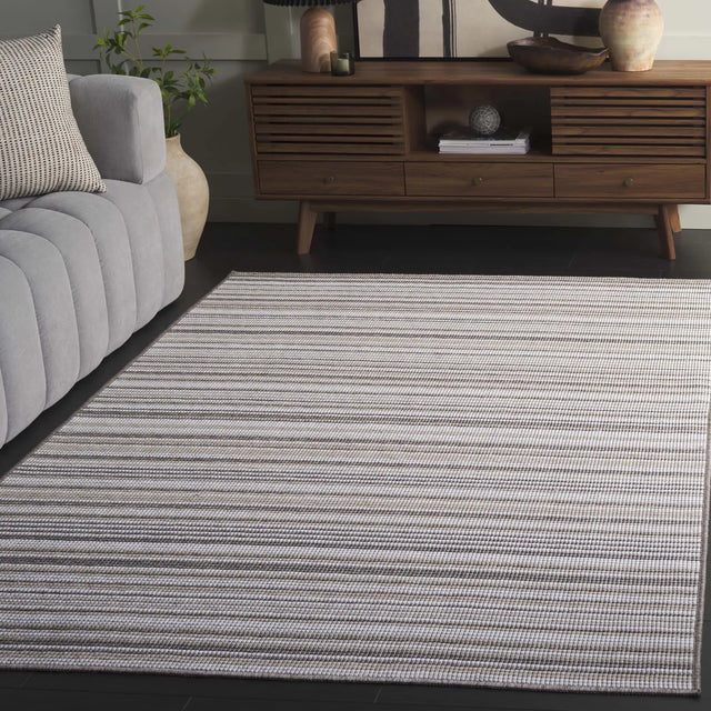 Safavieh Escape 600 5'-3" x 7'-6" Rug in Beige / Brown