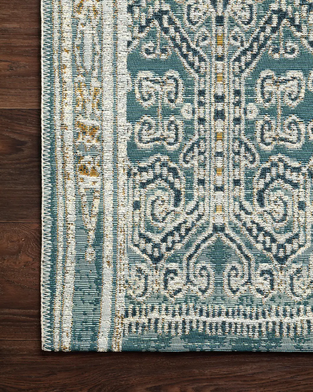 Loloi Mika Mik-05 Ocean Rugs - corner on wood