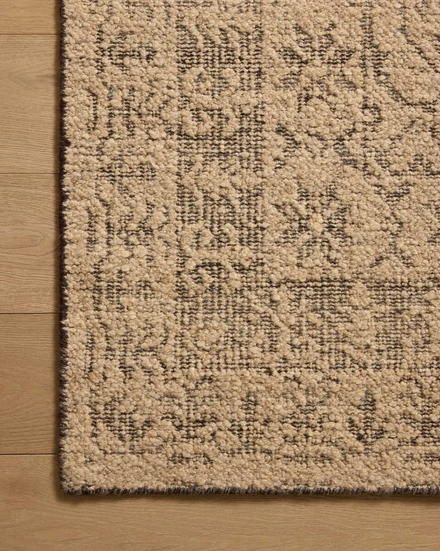 Loloi Novi NVI-01 Tan / Onyx Rug - corner on wood