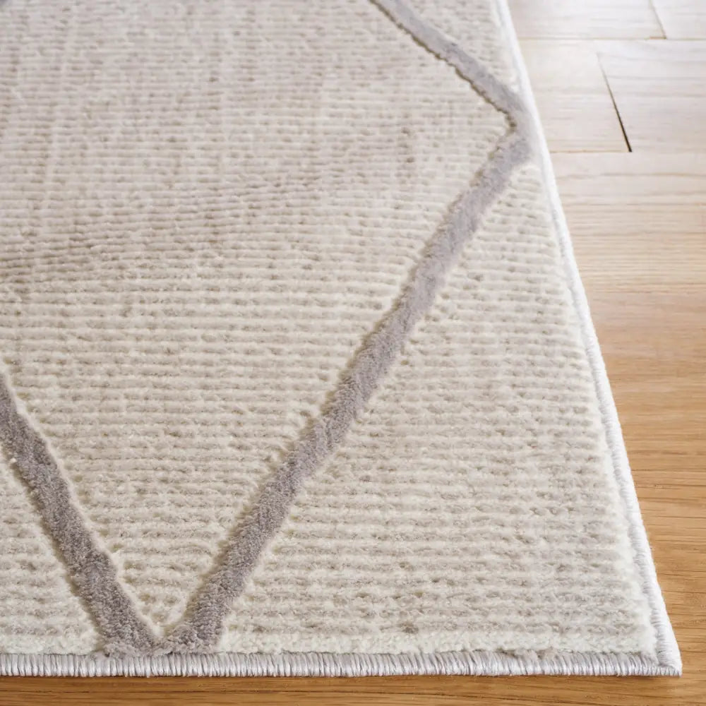 Safavieh Revive 5'-3" x 7'-7" Rug in Beige