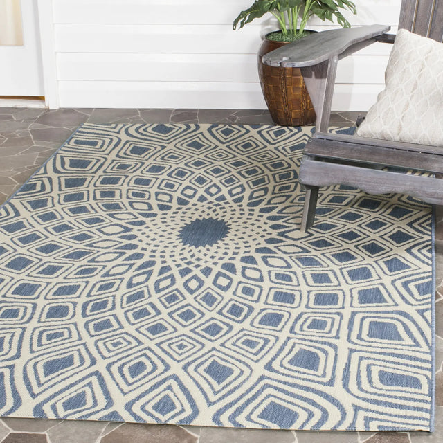 Safavieh Courtyard 5'-3" x 7'-7" Rug in Blue / Beige