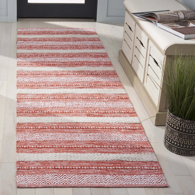 Safavieh Montauk 2'-3" x 8'-0" Rug in Orange / Ivory