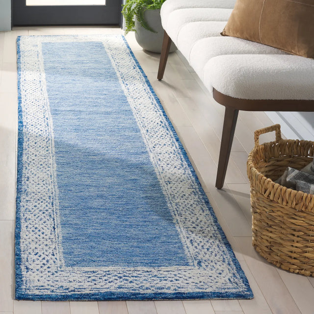 Safavieh Ebony 2'-3" x 9'-0" Rug in Blue / Ivory
