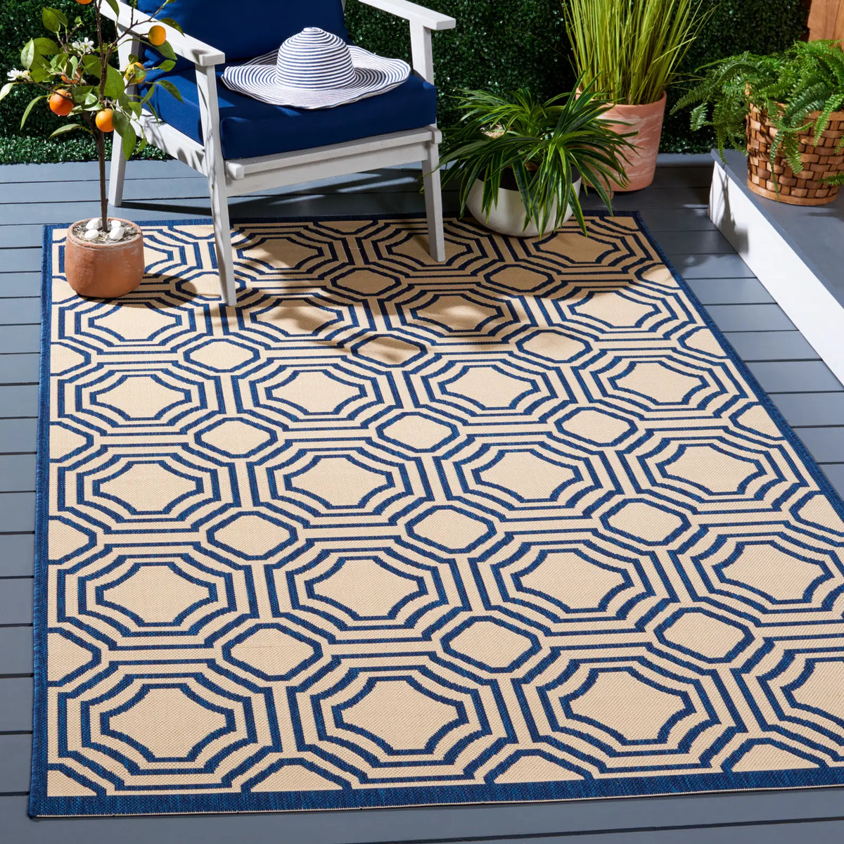 Safavieh Courtyard 5'-3" x 7'-7" Rug in Beige / Navy
