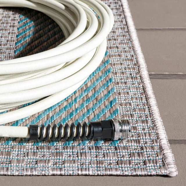 Safavieh Courtyard 5'-3" x 7'-7" Rug in Green / Aqua