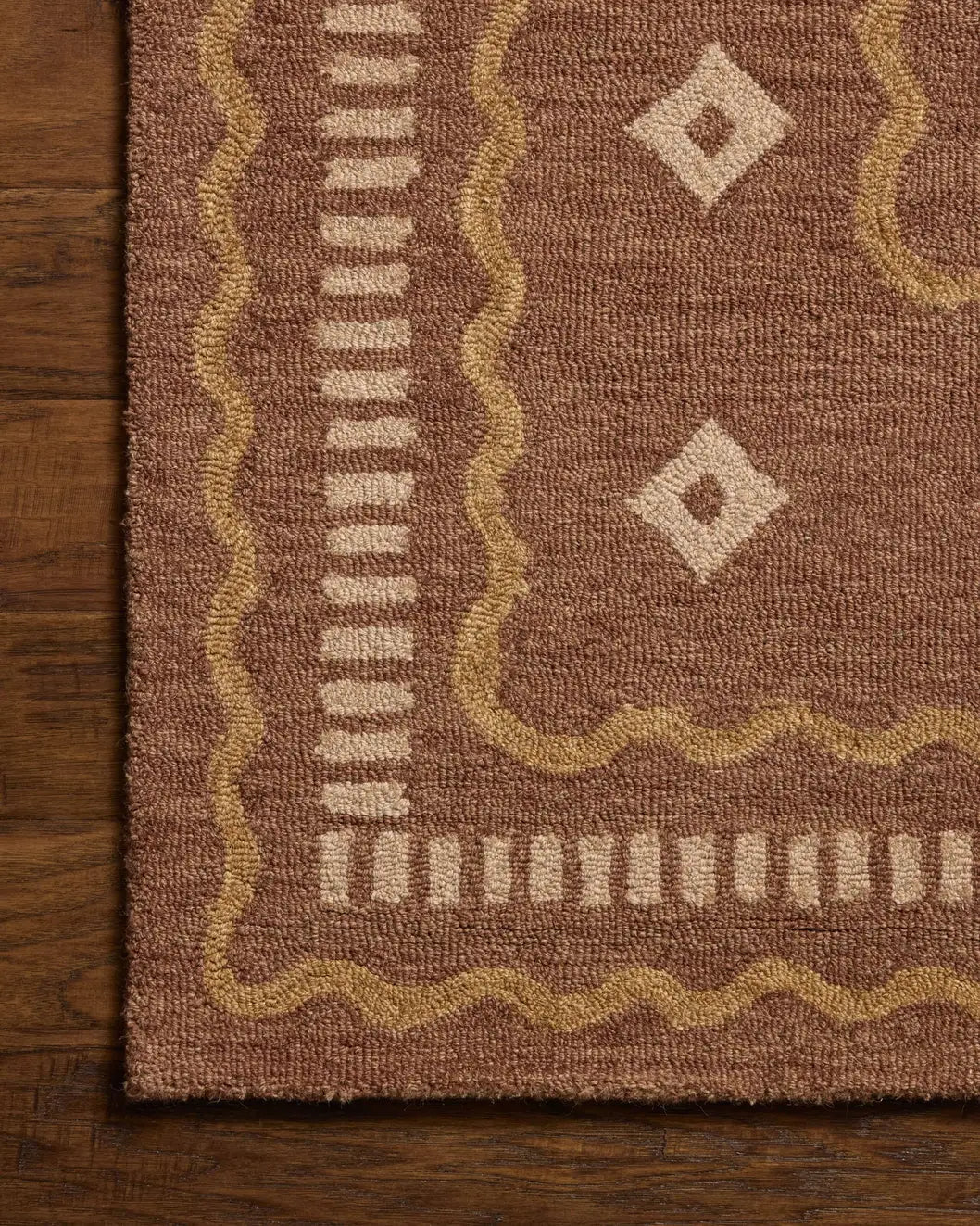 Chris Loves Julia x Loloi Alfie ALF-03 Clay / Spice Rug - corner on wood