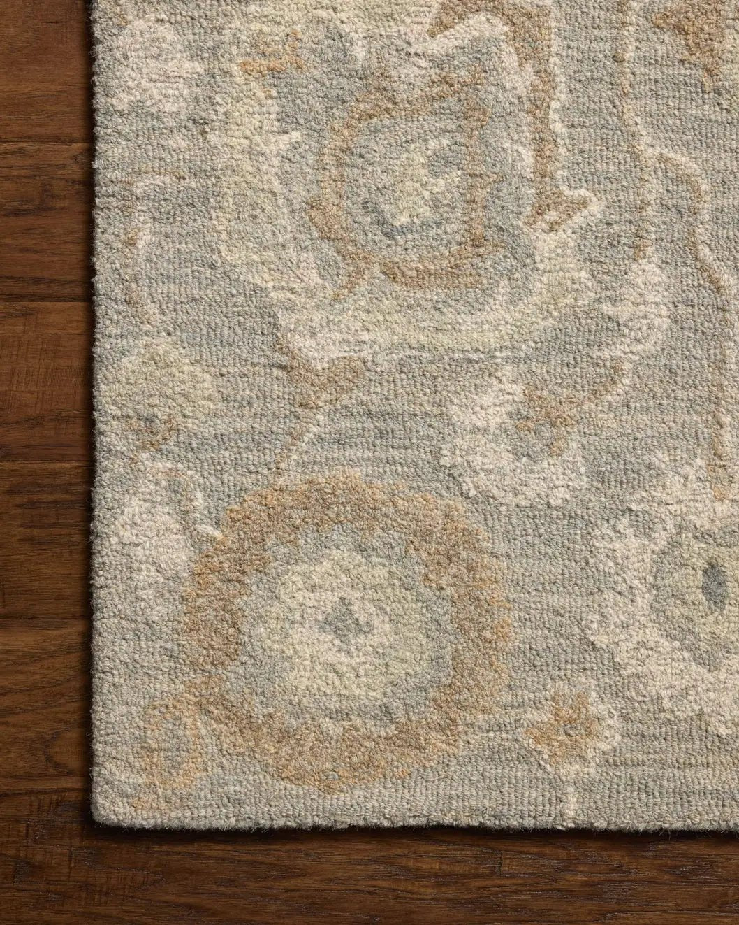 Chris Loves Julia x Loloi Dorothea DRT-01 Stone / Multi Rug - corner on wood