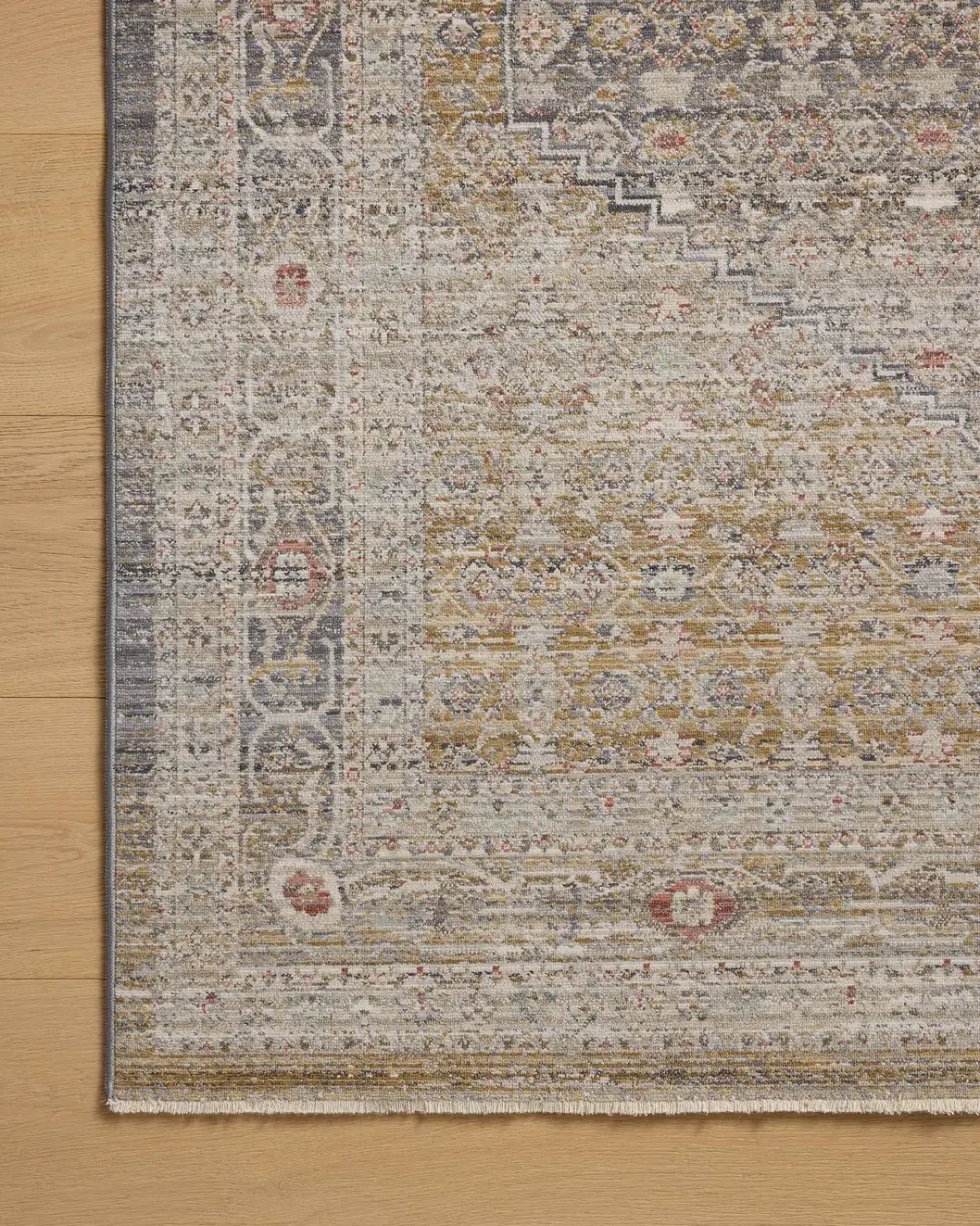 Chris Loves Julia x Loloi Ida IDA-02 Stone / Gold Rug - corner on wood