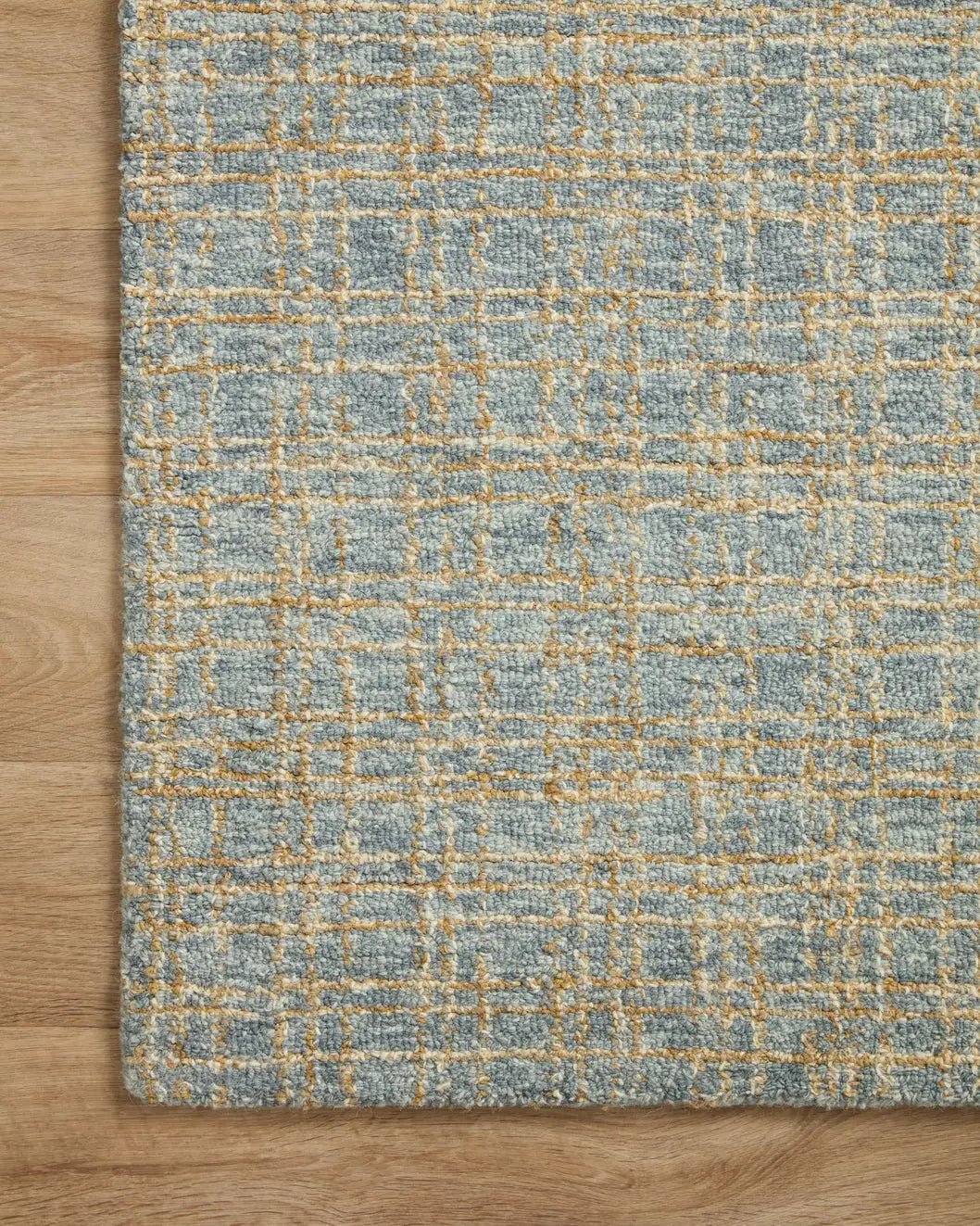 Chris Loves Julia x Loloi Polly POL-03 Blue / Sand Rug - corner on wood