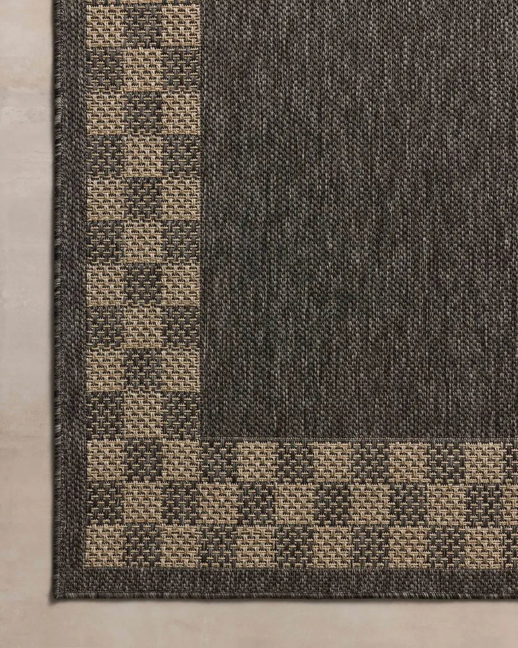 Chris Loves Julia x Loloi Providence PRC-01 Charcoal / Natural Rug - corner on wood