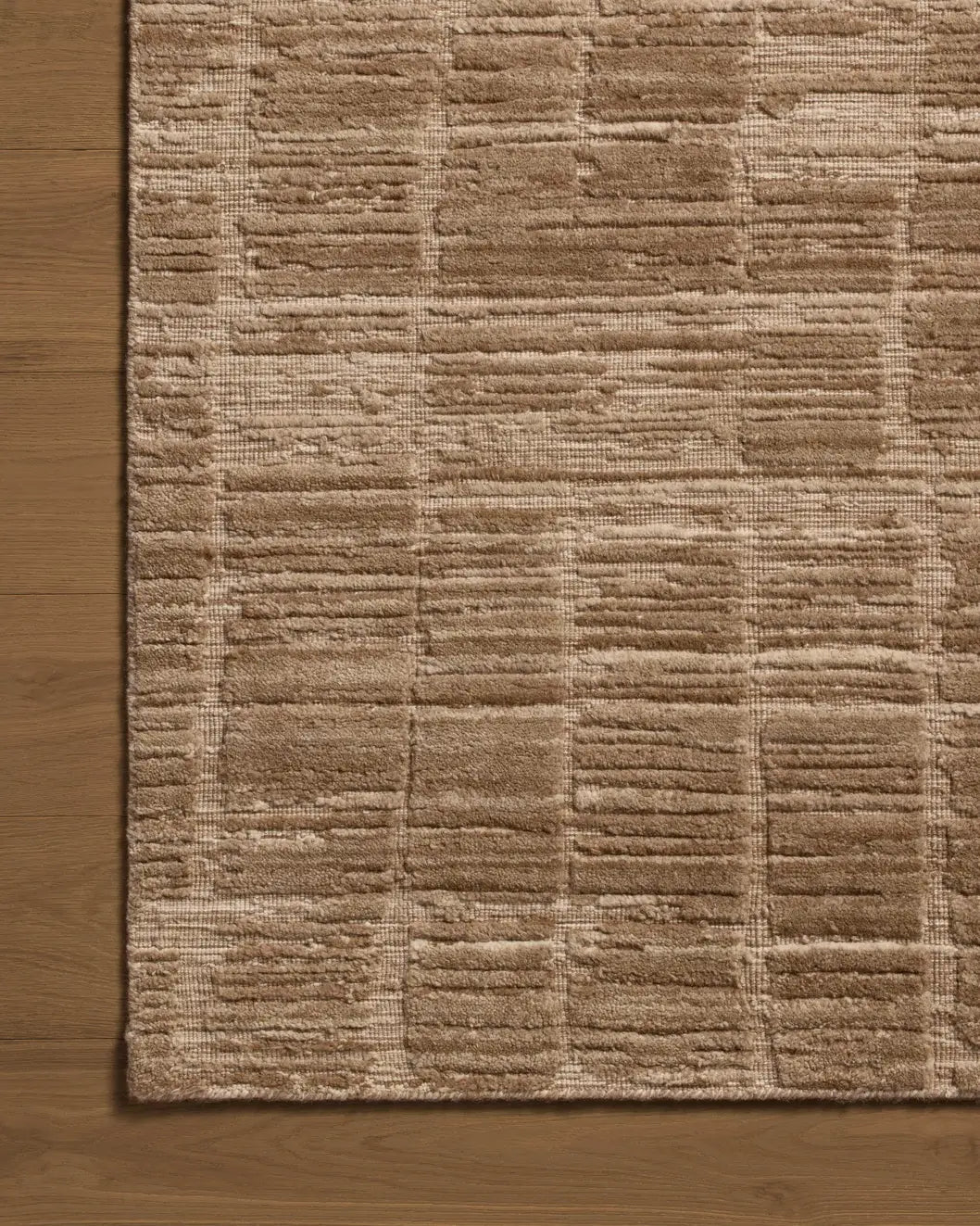 Jean Stoffer x Loloi Daniel DAN-01 Fawn Rug - corner on wood