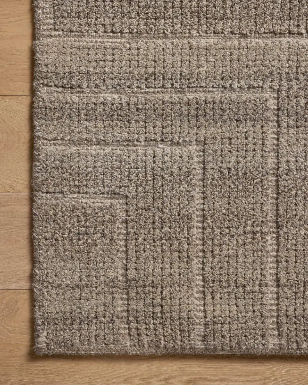 Loloi Asha ASA-02 Bark Rug - corner on wood