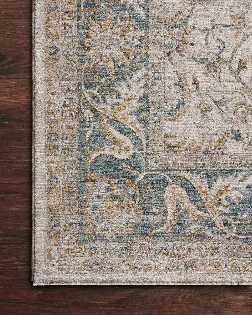 Loloi Gaia Gaa-04 Natural/Ocean Rug - corner on wood