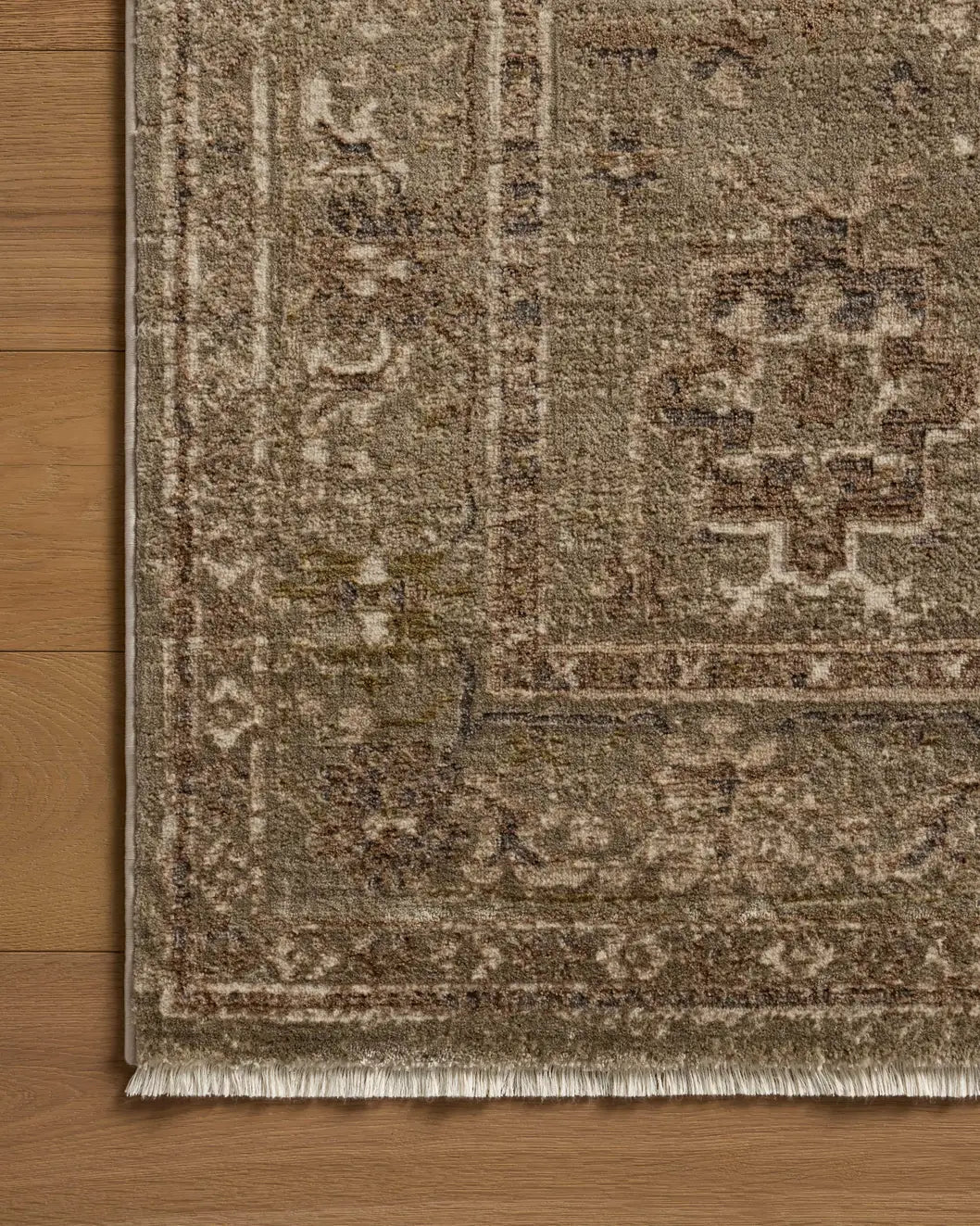 Loloi Haywood HYD-04 Sage / Earth Rug - corner on wood