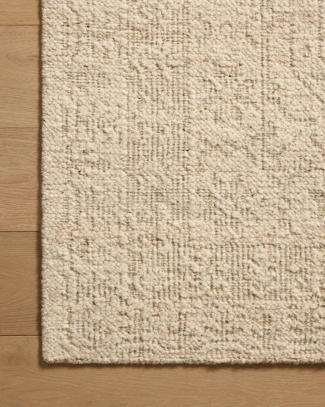 Loloi Novi NVI-01 Fog / Stone Rug - corner on wood