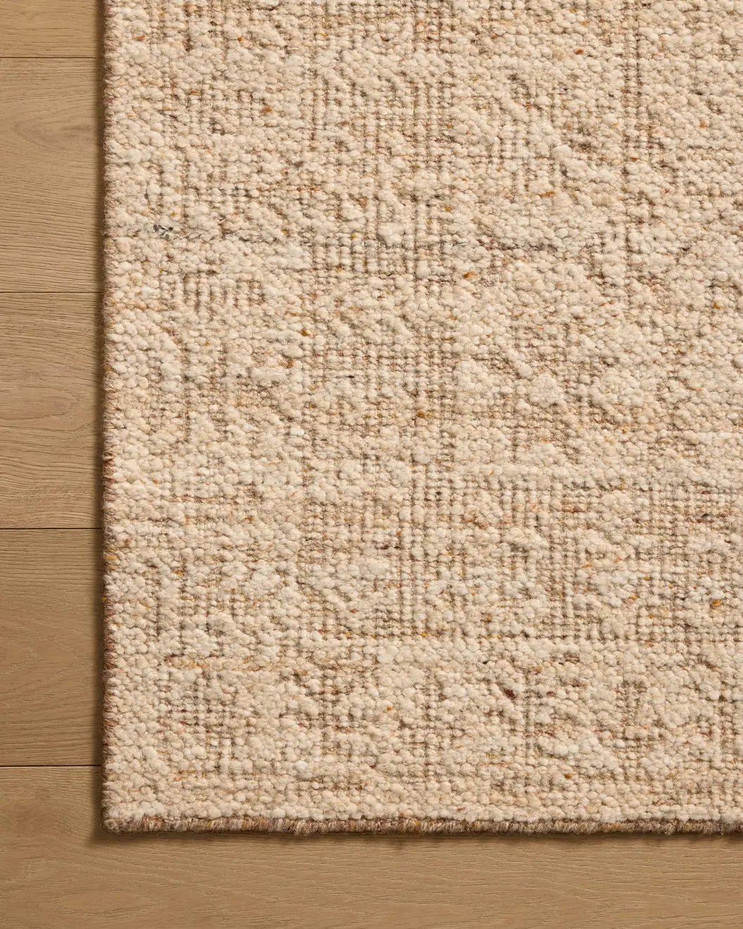 Loloi Novi NVI-01 Natural / Clay Rug - corner on wood