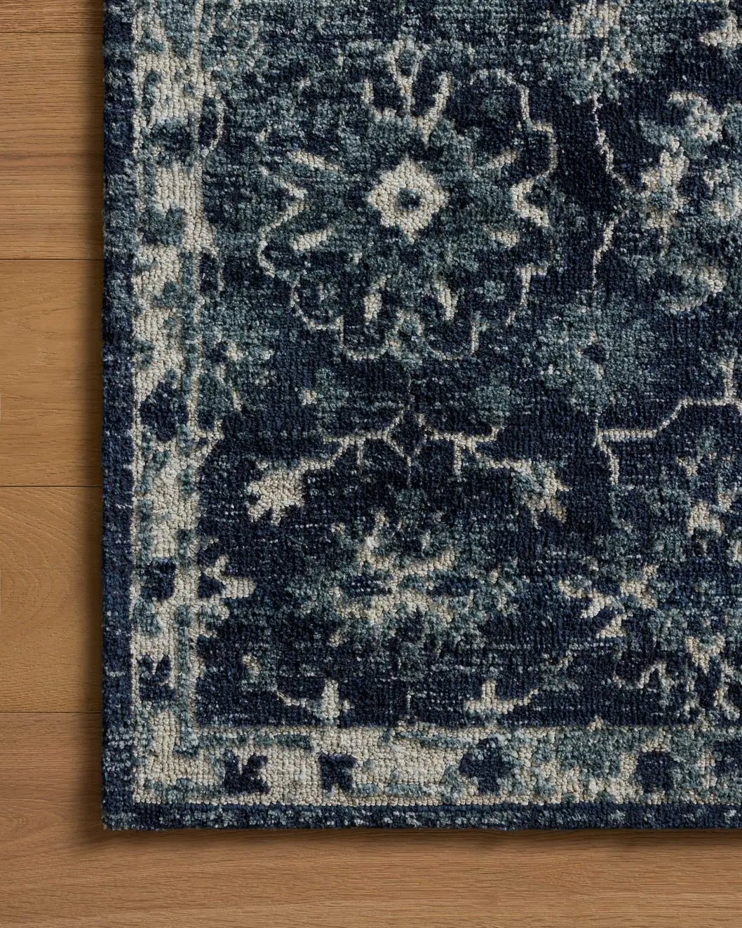 Loloi Percival PCV-02 Navy / Ivory Rug - corner on wood