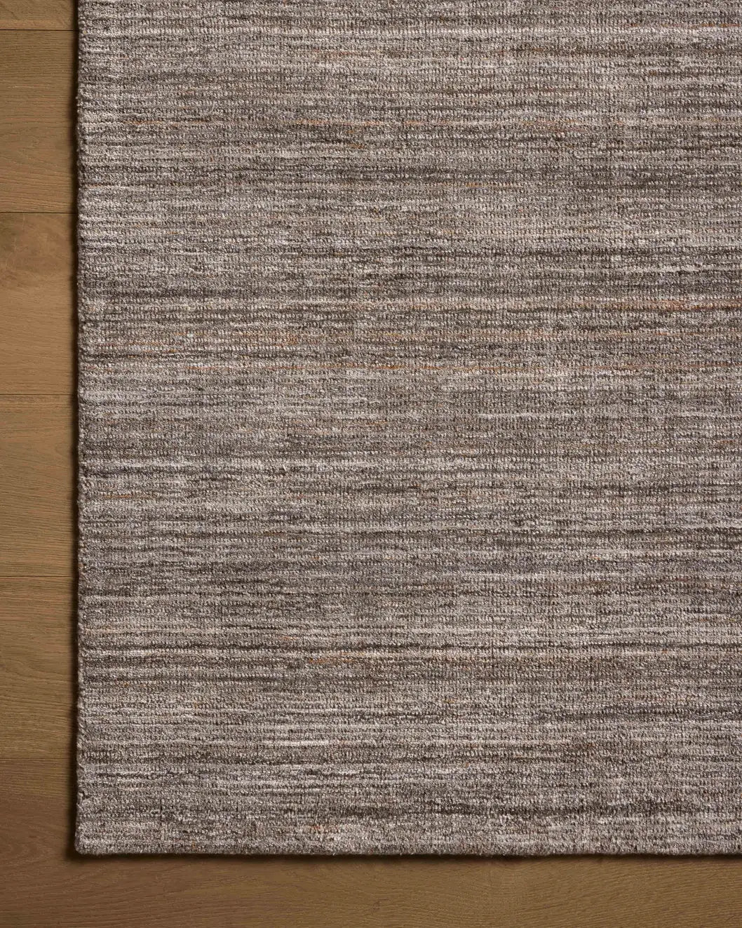 Loloi Thorne THT-01 Stone Rug - corner on wood