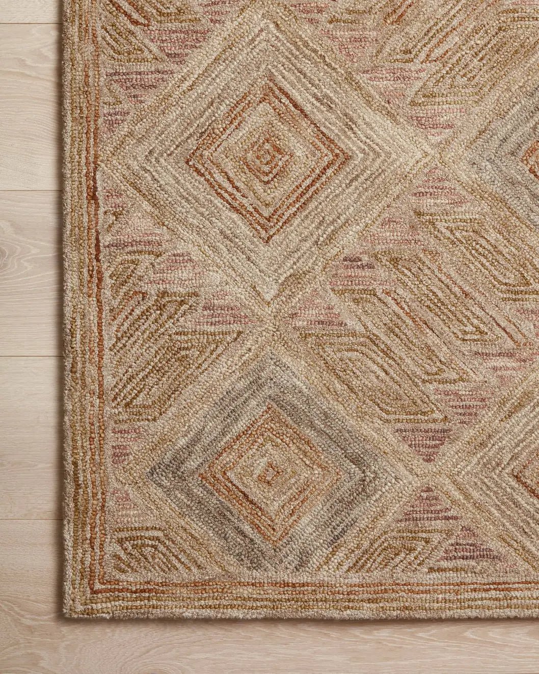 Loloi Varena Var-02 Berry/Multi Rug - corner on wood