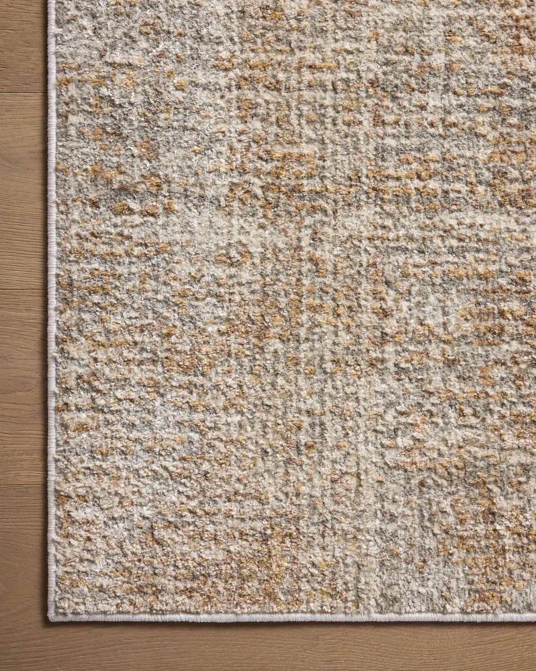 Loloi Wyatt Wya-01 Spice/Silver Rug - corner on wood
