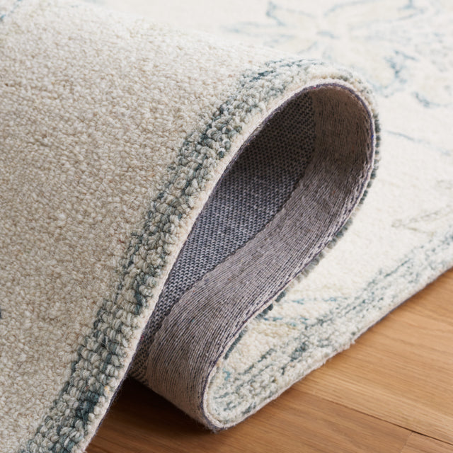 Safavieh Micro-Loop Mlp477A Ivory/Blue Rug.