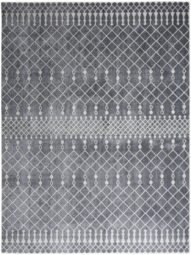 Denim blue geometric rug with lattice pattern and short tassel fringe