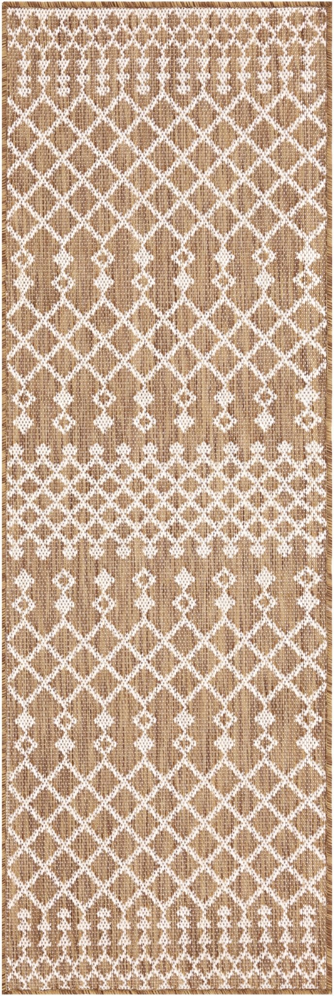 Rectangular jute rug with tan base and white diamond lattice pattern, border edges