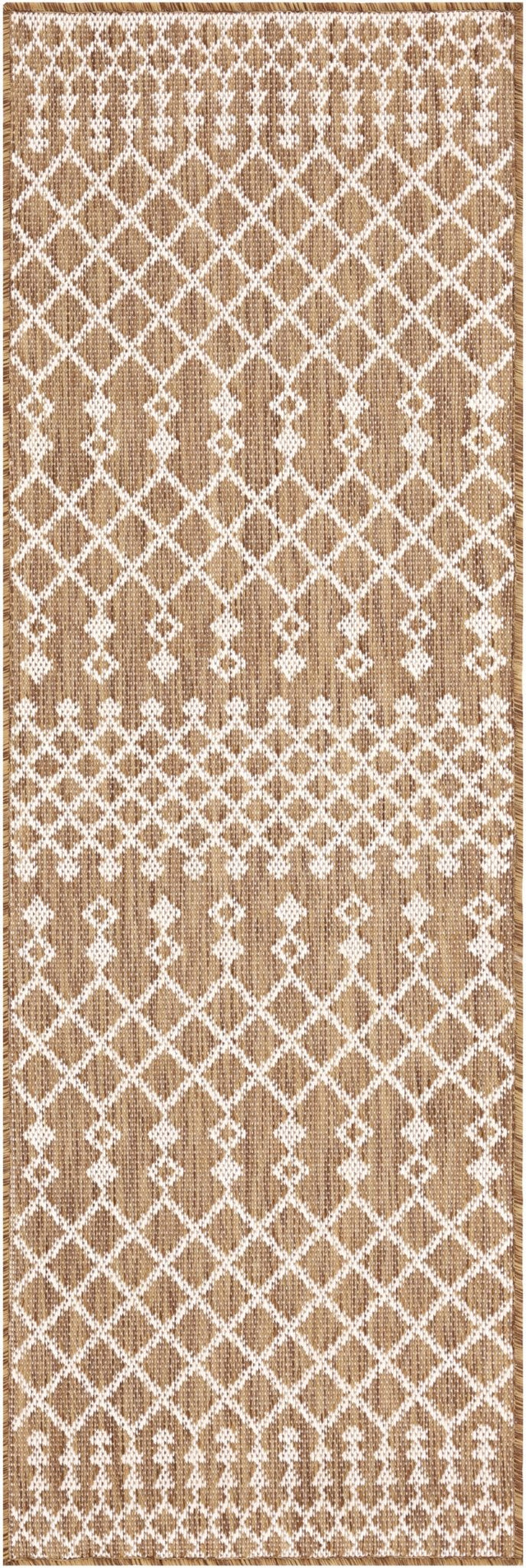 Rectangular jute rug with tan base and white diamond lattice pattern, border edges