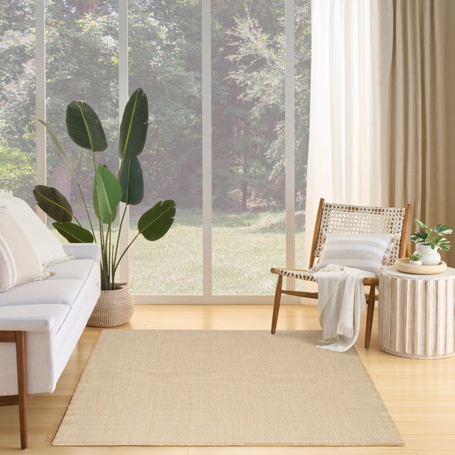 Natural flatwoven area rug with tight lattice pattern and tan border