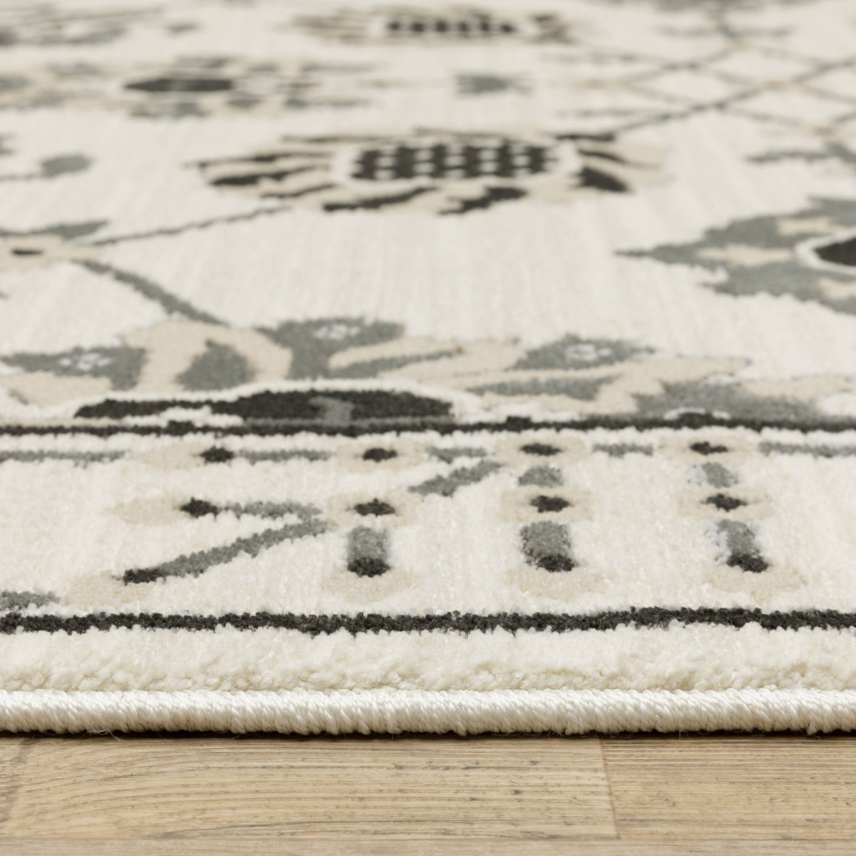 Oriental Weavers Sphinx Raylan Ray03 Ivory/ Grey Rug.