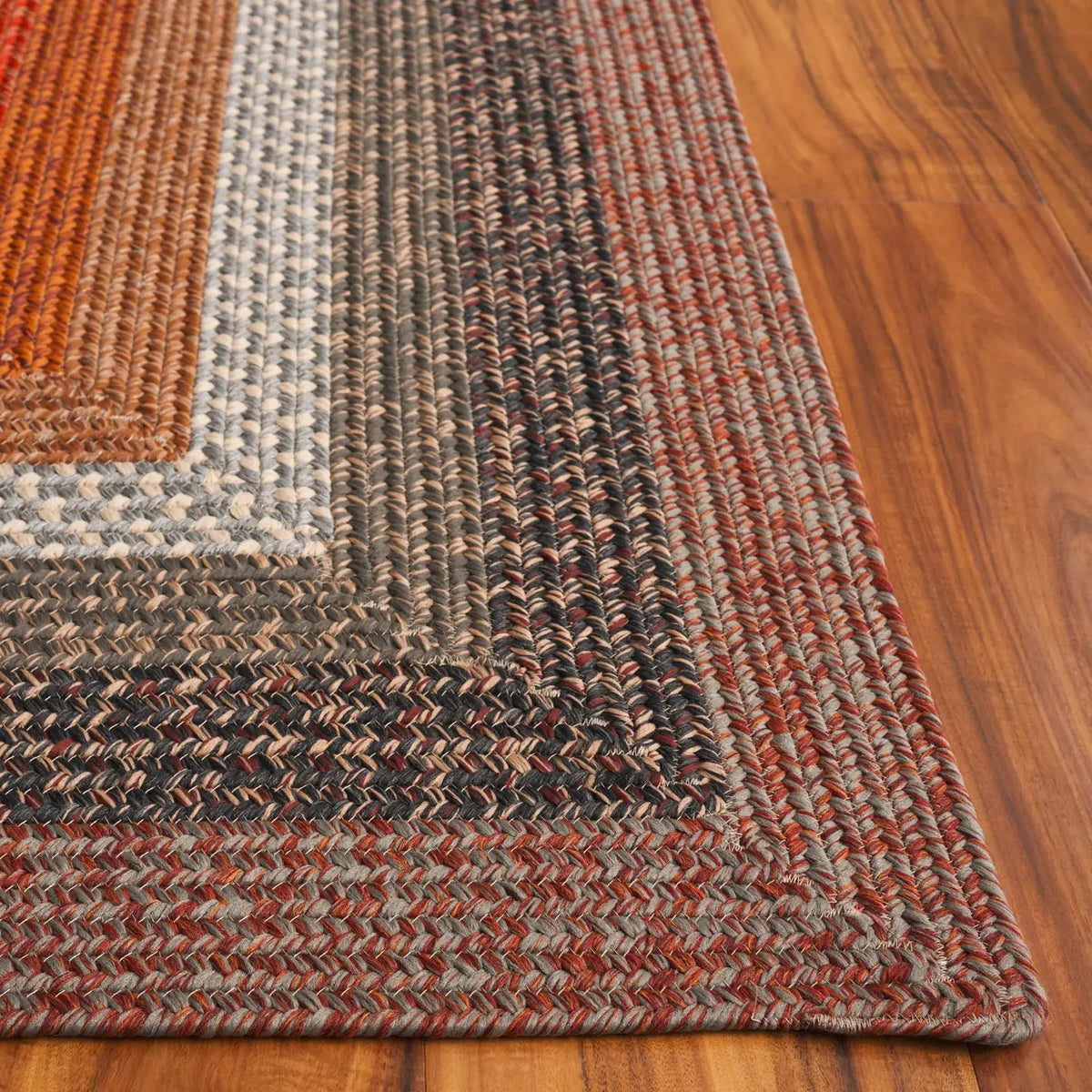 Safavieh Braided 5'-0" x 8'-0" Rug in Brown / Rust