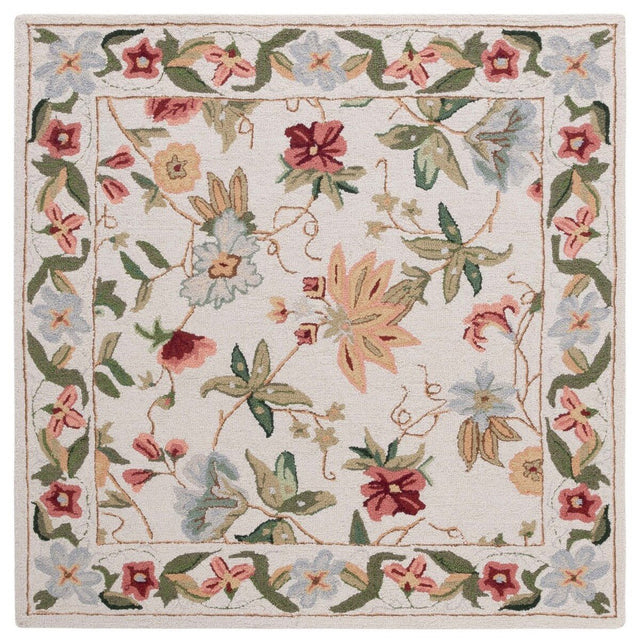 Ivory area rug with colorful floral vines and ornate border