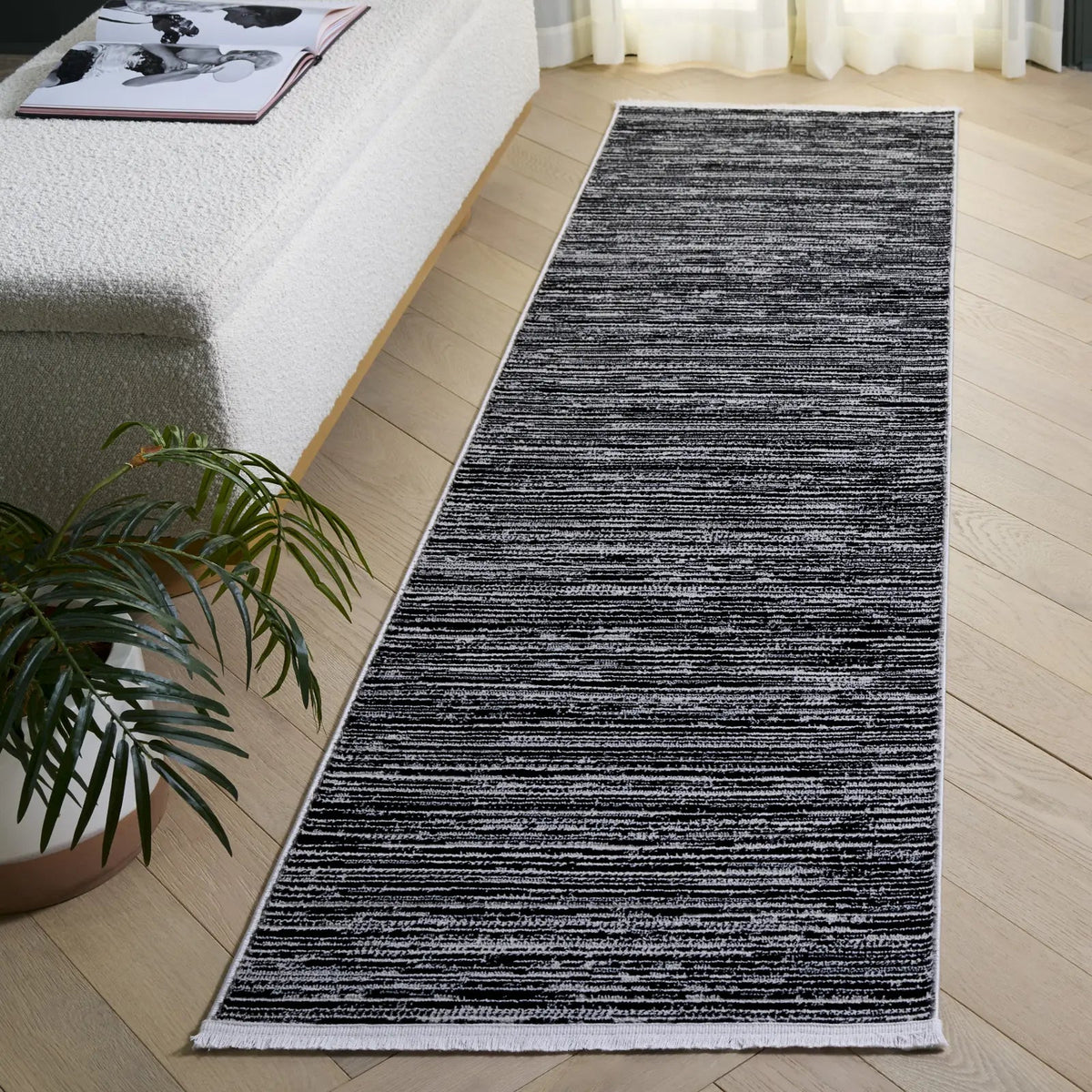 Safavieh Mila 2'-2" x 8'-0" Rug in Black / Ivory