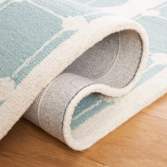 Safavieh Safavieh Kids Sfk927K Turquoise/Ivory Rug.