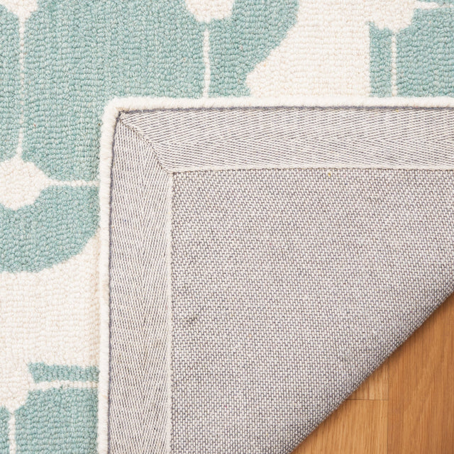 Safavieh Safavieh Kids Sfk927K Turquoise/Ivory Rug.