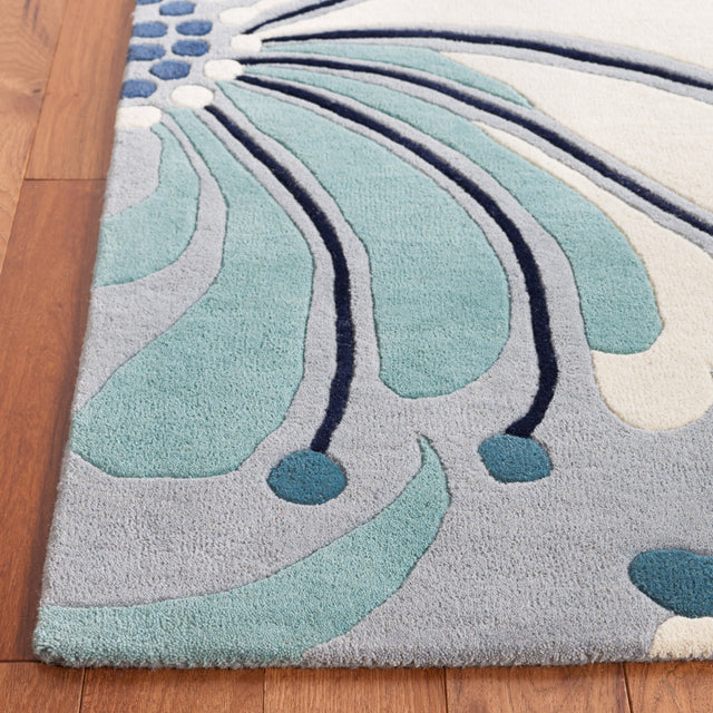 Safavieh Soho Soh826M Blue/Ivory Rug.