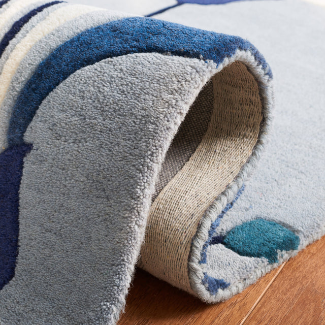 Safavieh Soho Soh826M Blue/Ivory Rug.