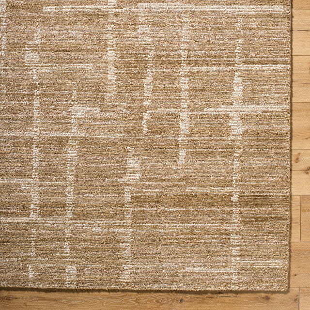 Handmade rug in tan with cream abstract stripes and speckled texture