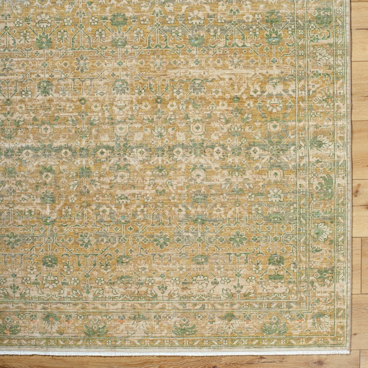 Handmade rug, beige with green and gold ornate medallion pattern and border