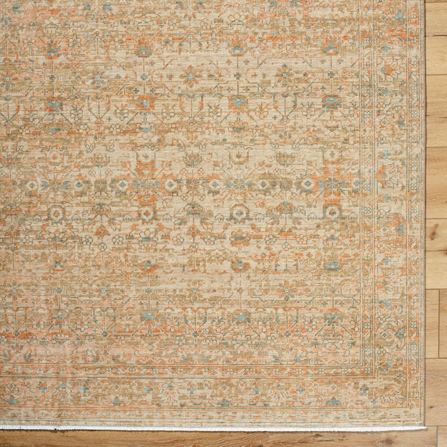 Handmade rectangular rug with ornate vintage pattern, beige tan with orange and blue accents