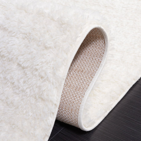 Safavieh Tahoe Shag Tho651A Ivory Rug.