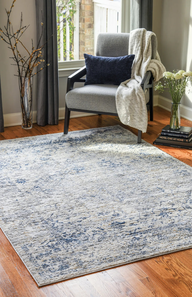 United Weavers Austin Clark Blue Rug - round room scene