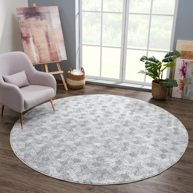 United Weavers Reserve La Luna Black Rug - round room scene