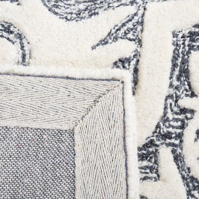 Safavieh Metro Met859Z Black/Ivory Rug.