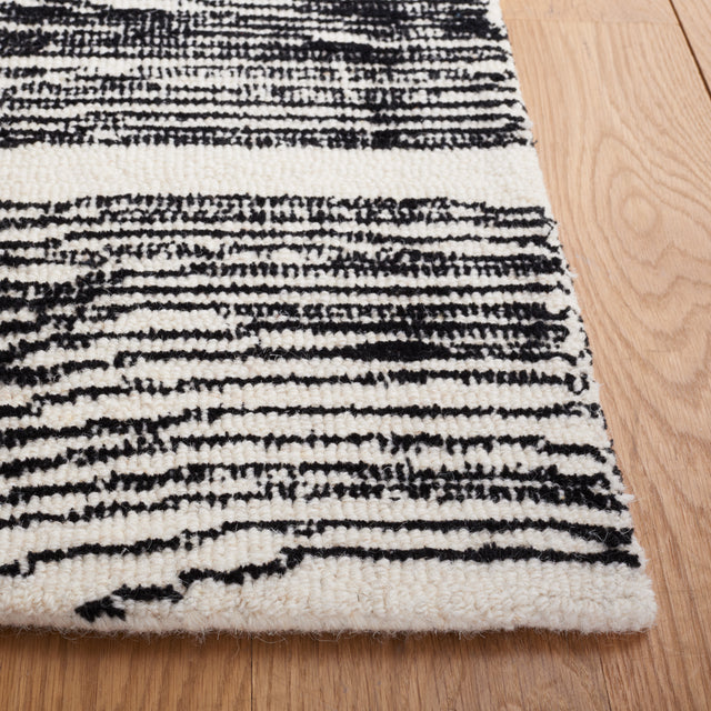 Safavieh Metro Met995B Ivory/Black Rugs.