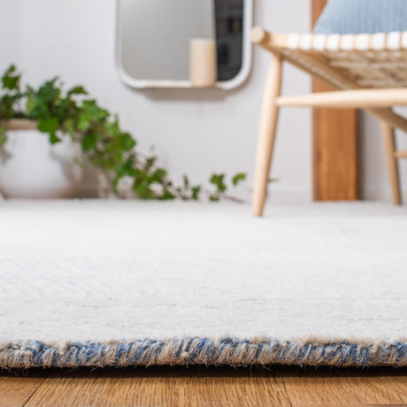 Safavieh Metro Met999M Blue/Ivory Rugs.